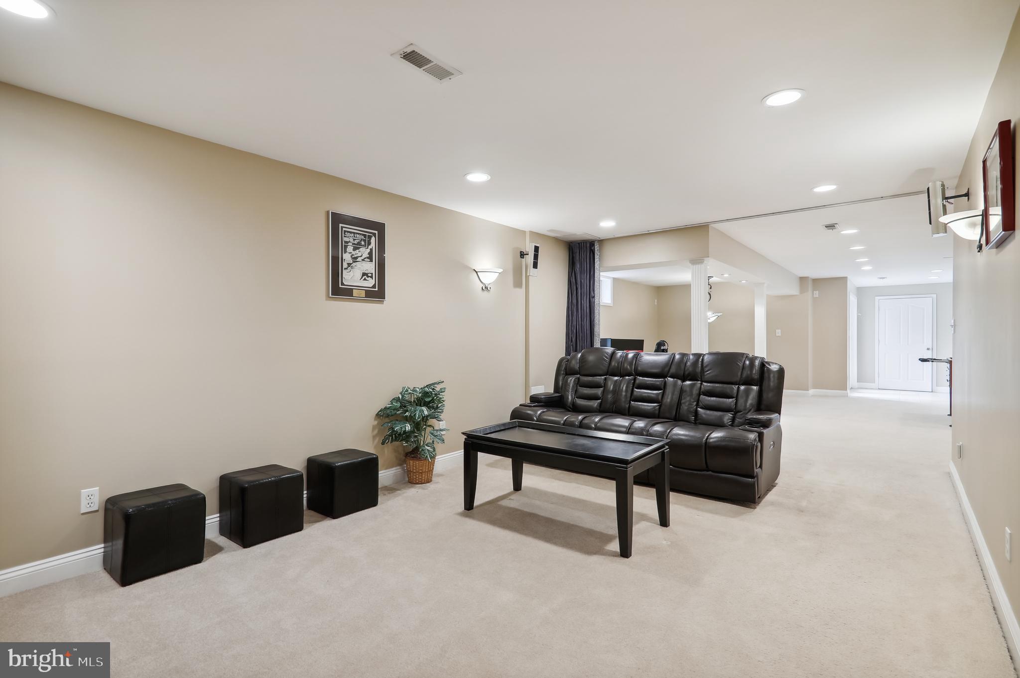 12101 Sheets Farm Road North Potomac, MD 20878 - Photo 61 of 105 Lower level movie room with surround sound