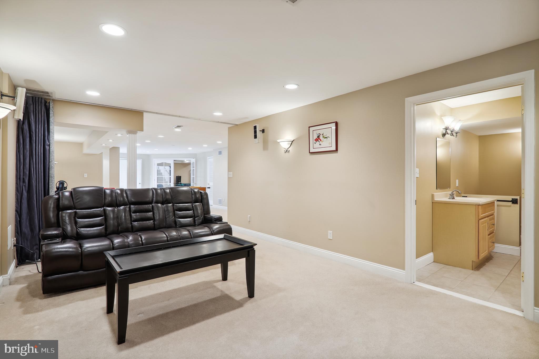 12101 Sheets Farm Road North Potomac, MD 20878 - Photo 62 of 105 Lower level Movie room leading into full bathroom