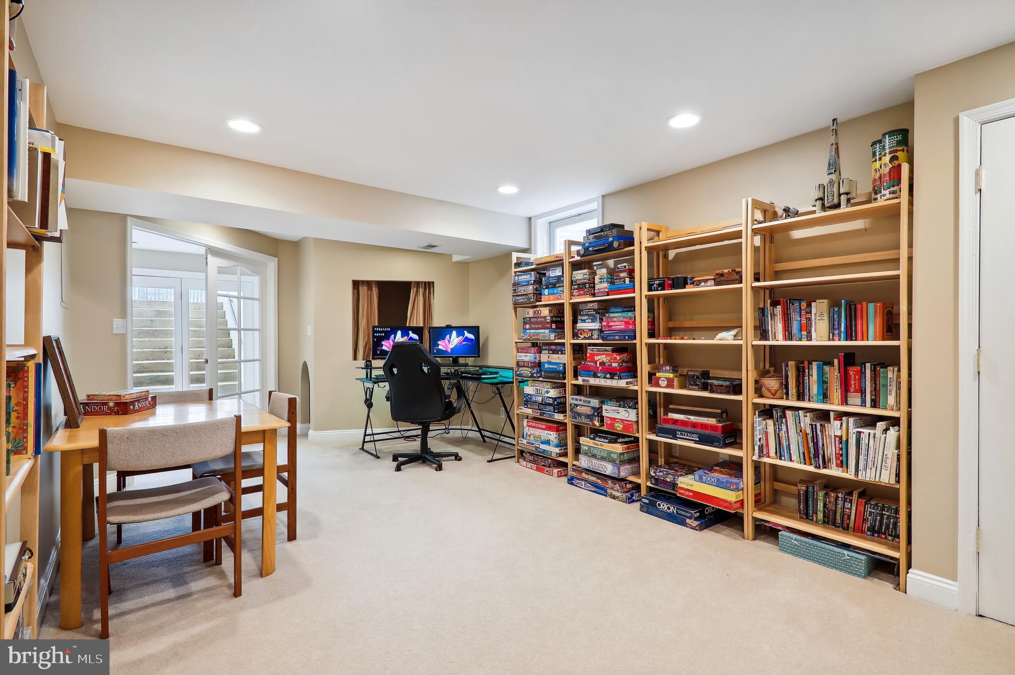 12101 Sheets Farm Road North Potomac, MD 20878 - Photo 68 of 105 Lower level playroom with built in puppet stage