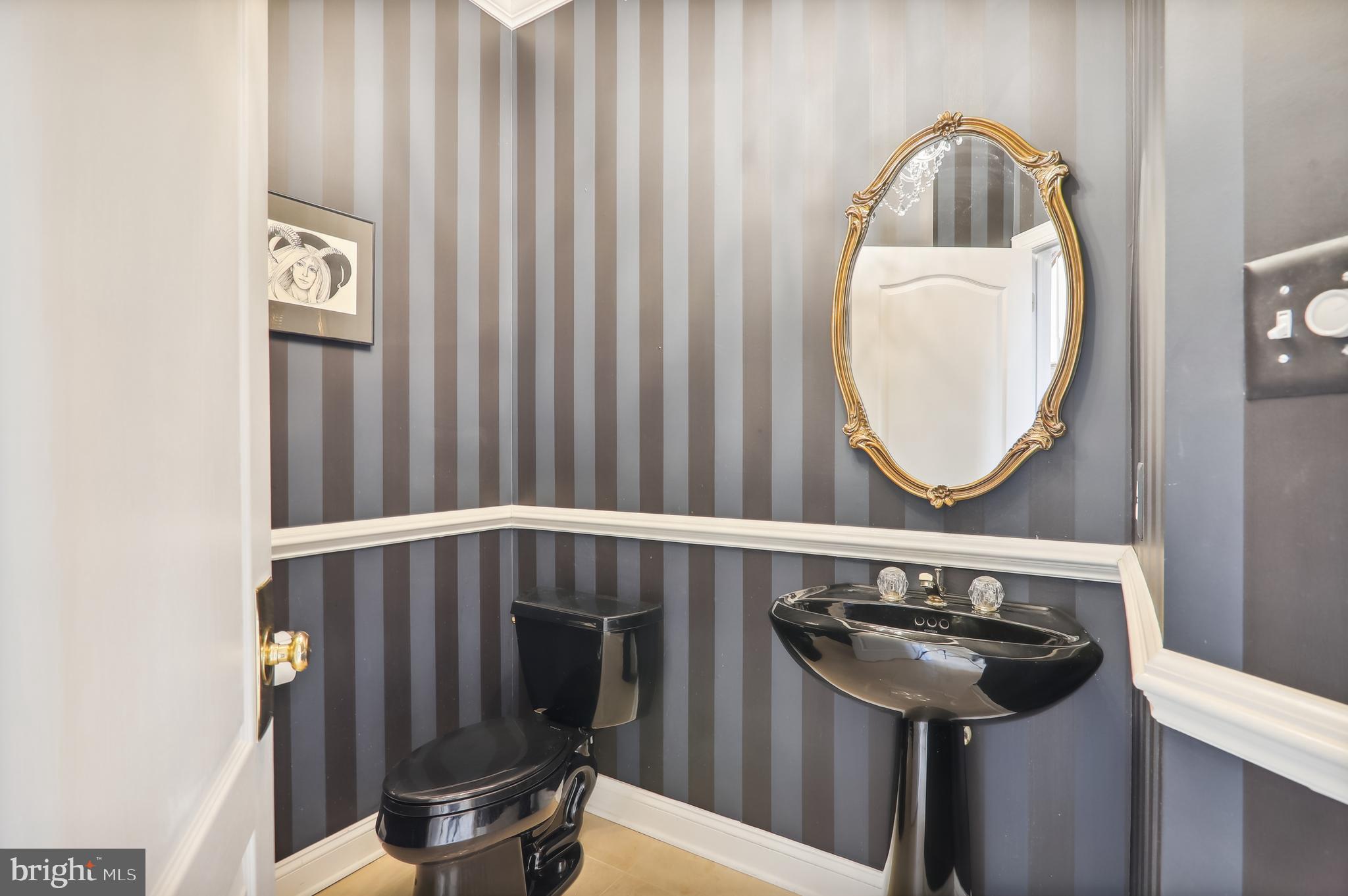 12101 Sheets Farm Road North Potomac, MD 20878 - Photo 8 of 105 Main level elegant powder room with chandelier