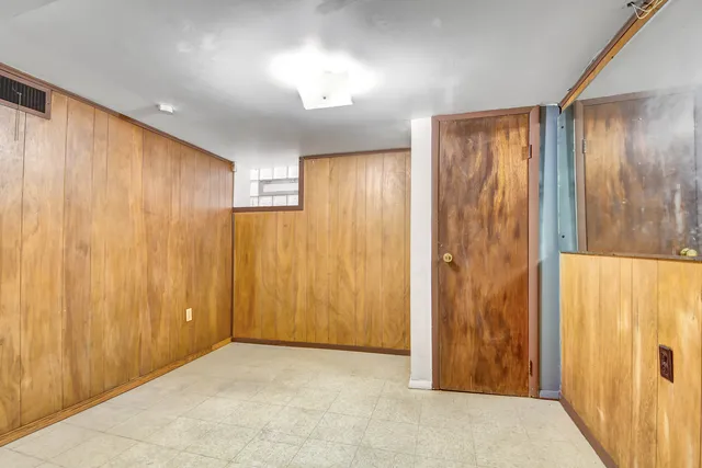 a view of a hallway with closet area