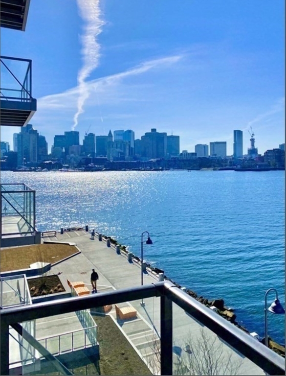 45 Lewis Street, Unit 312 Boston, MA 02128 - Photo 4 of 17 a view of a balcony with an ocean