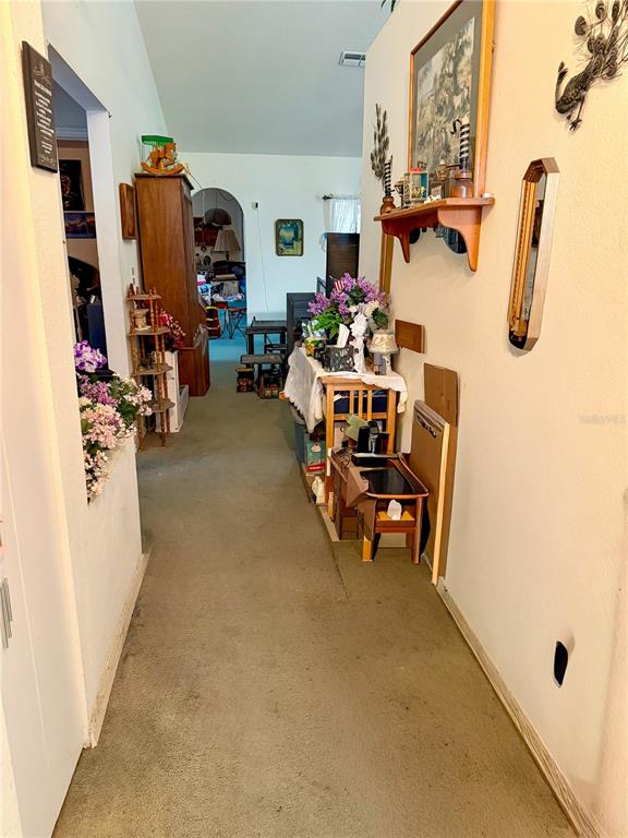 14030 Hexam Road Brooksville, FL 34613 - Photo 2 of 18 a view of a room with gym equipment