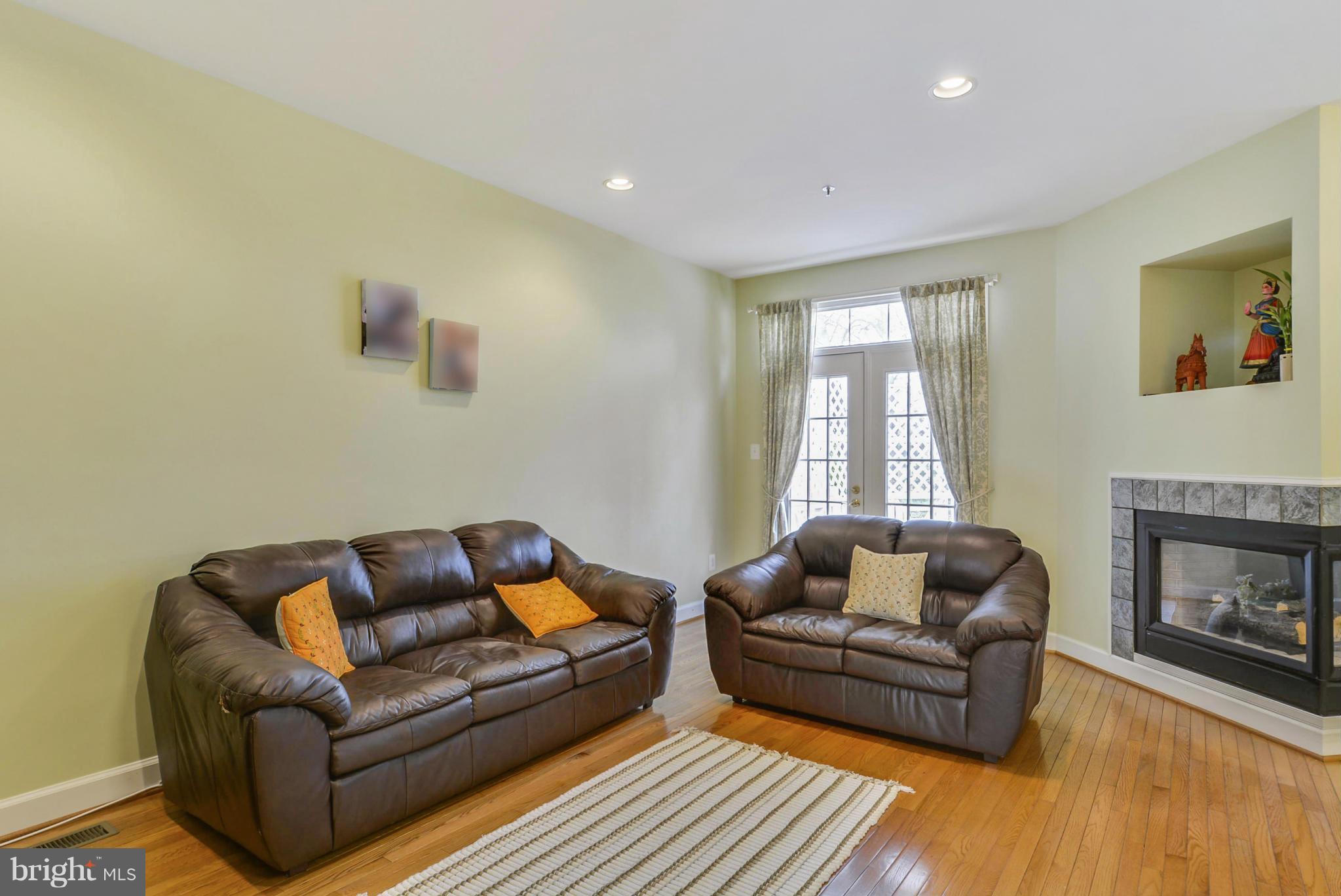 8520 Bells Ridge Terrace Potomac, MD 20854 - Photo 12 of 30 Family Room with 2 sided Fireplace