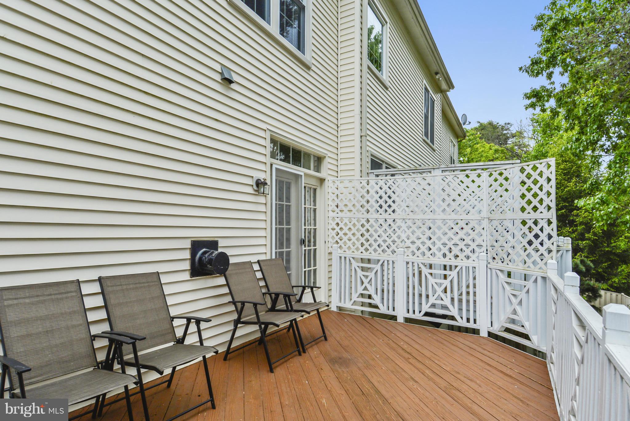 8520 Bells Ridge Terrace Potomac, MD 20854 - Photo 15 of 30 Large deck overlooking tree vista