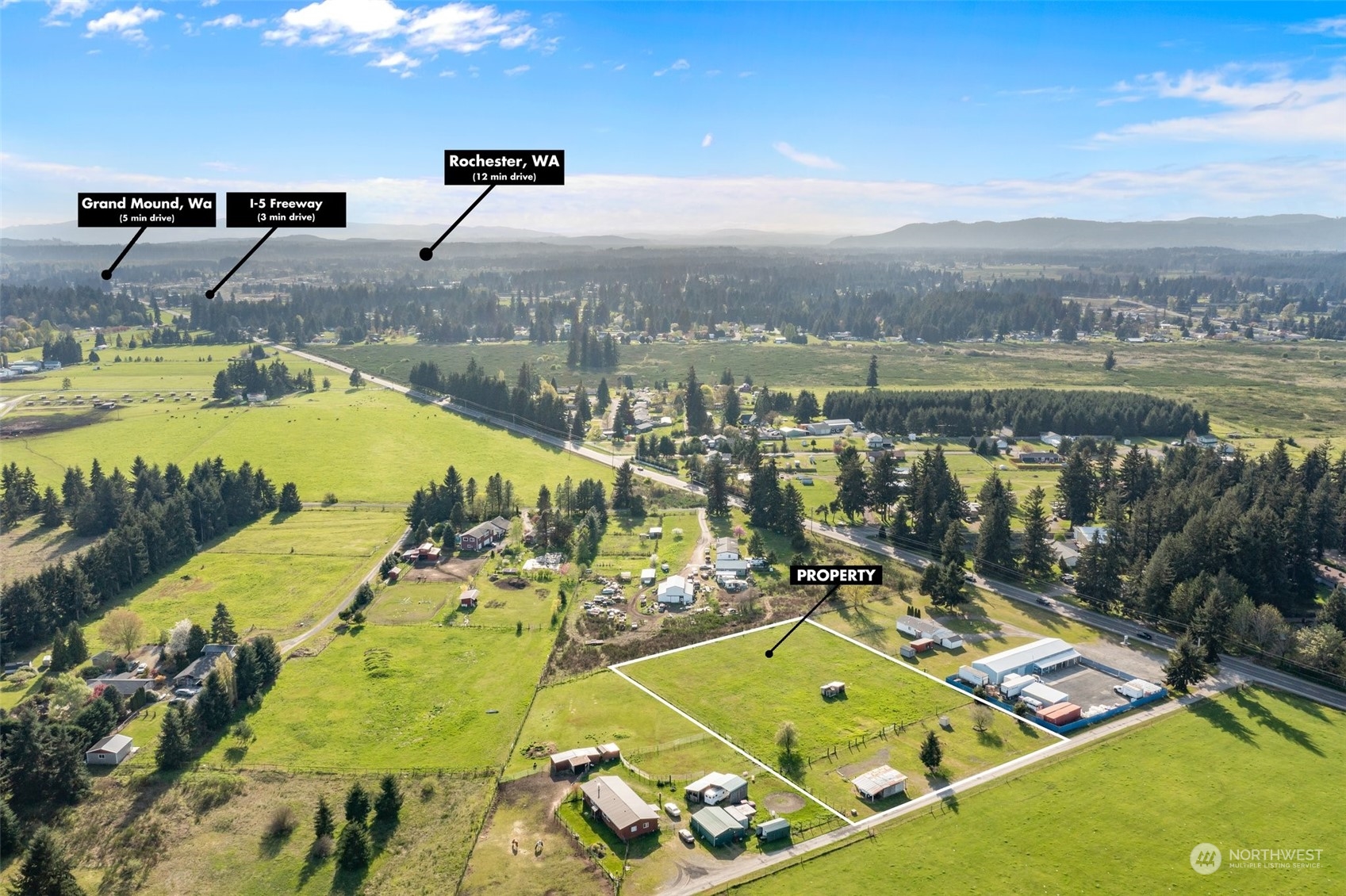 18626 Old Highway 99 Southwest Rochester, WA 98579 - Photo 3 of 20 an aerial view of a swimming pool with seating area
