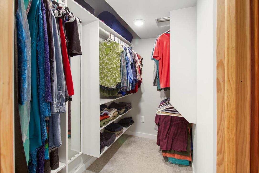 25057 7th Street Summerland Key, FL 33042 - Photo 13 of 43 a view of walk in closet with clothes and shoes
