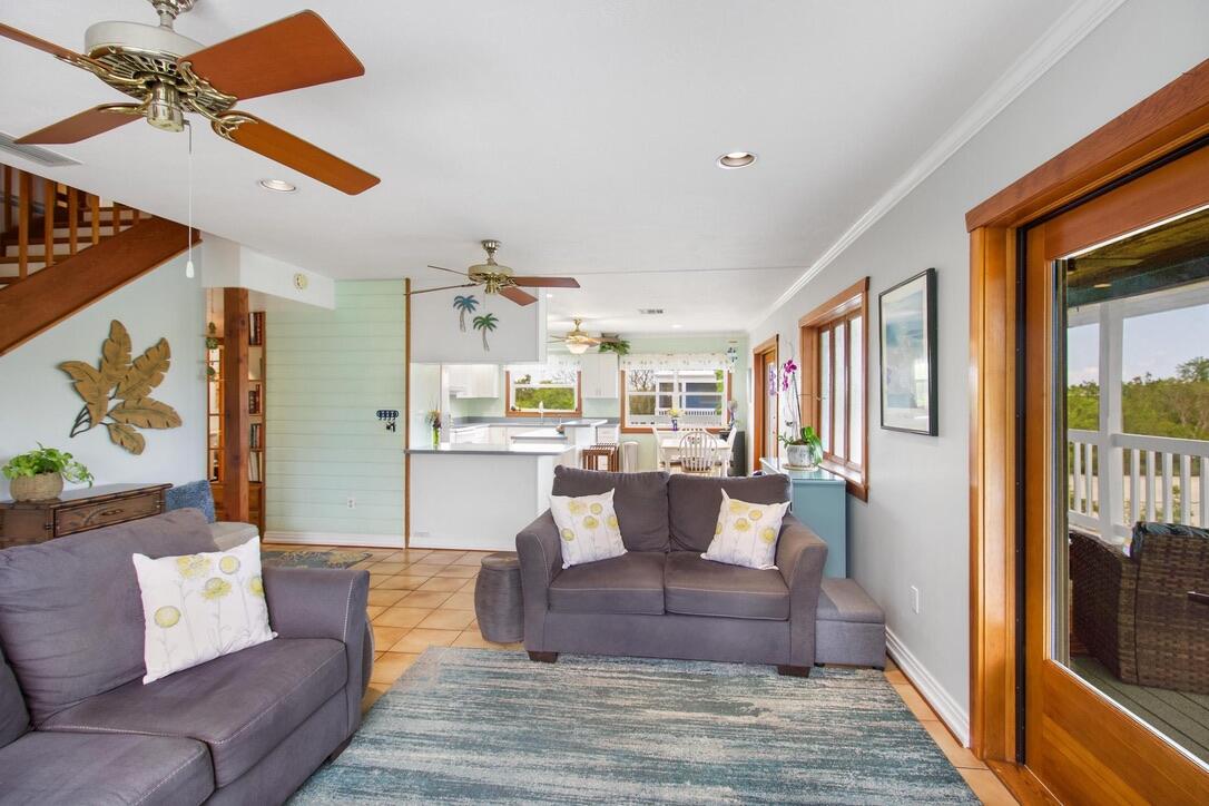 25057 7th Street Summerland Key, FL 33042 - Photo 25 of 43 a living room with furniture and a fireplace