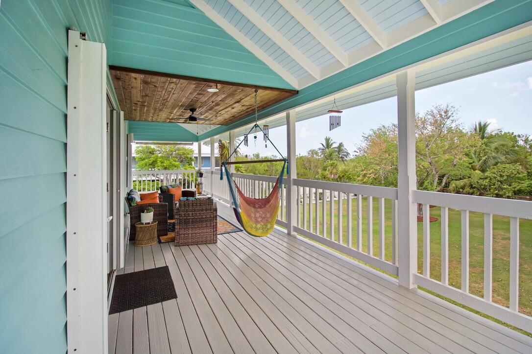 25057 7th Street Summerland Key, FL 33042 - Photo 40 of 43 a view of a balcony with wooden floor