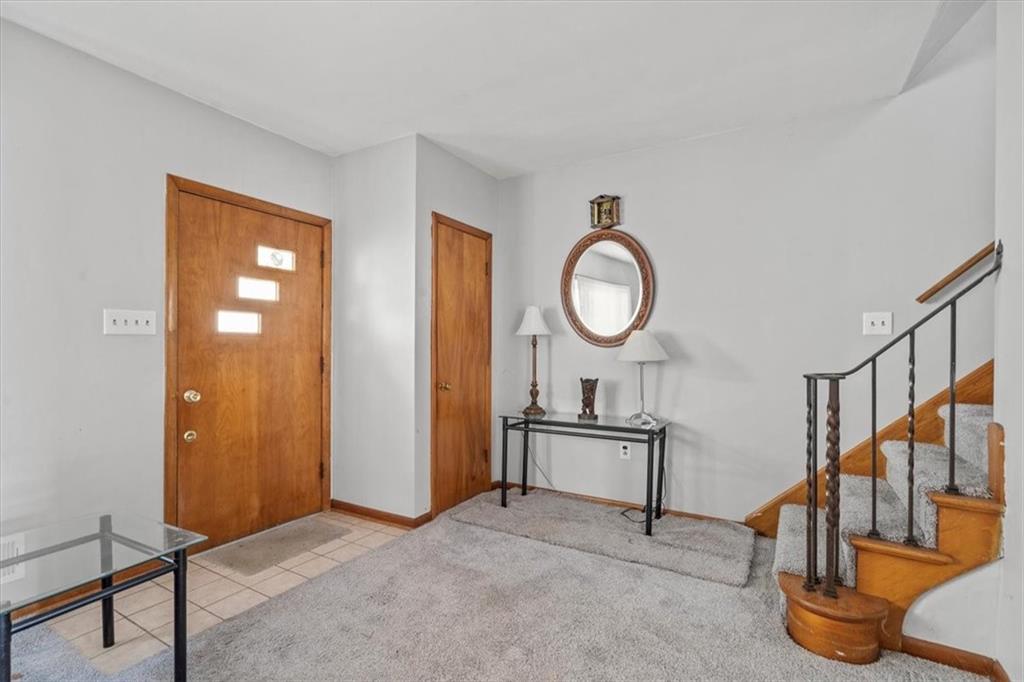 1105 15th Street McKees Rocks, PA 15136 - Photo 3 of 17 a view of an entryway with wooden floor and mirror