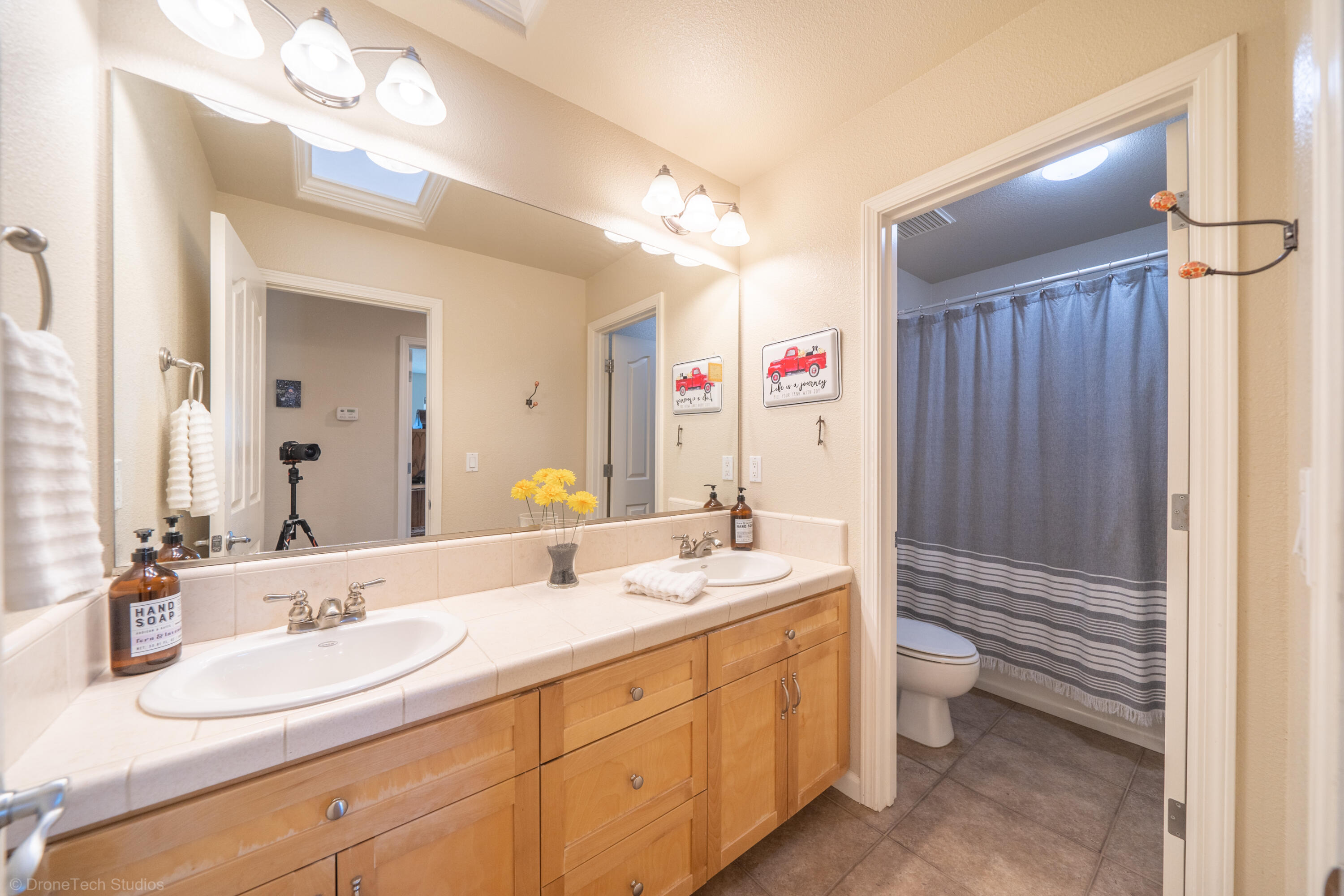 16671 Power Line Road Redding, CA 96001 - Photo 24 of 105 Double sinks 7 Skylight hall bath