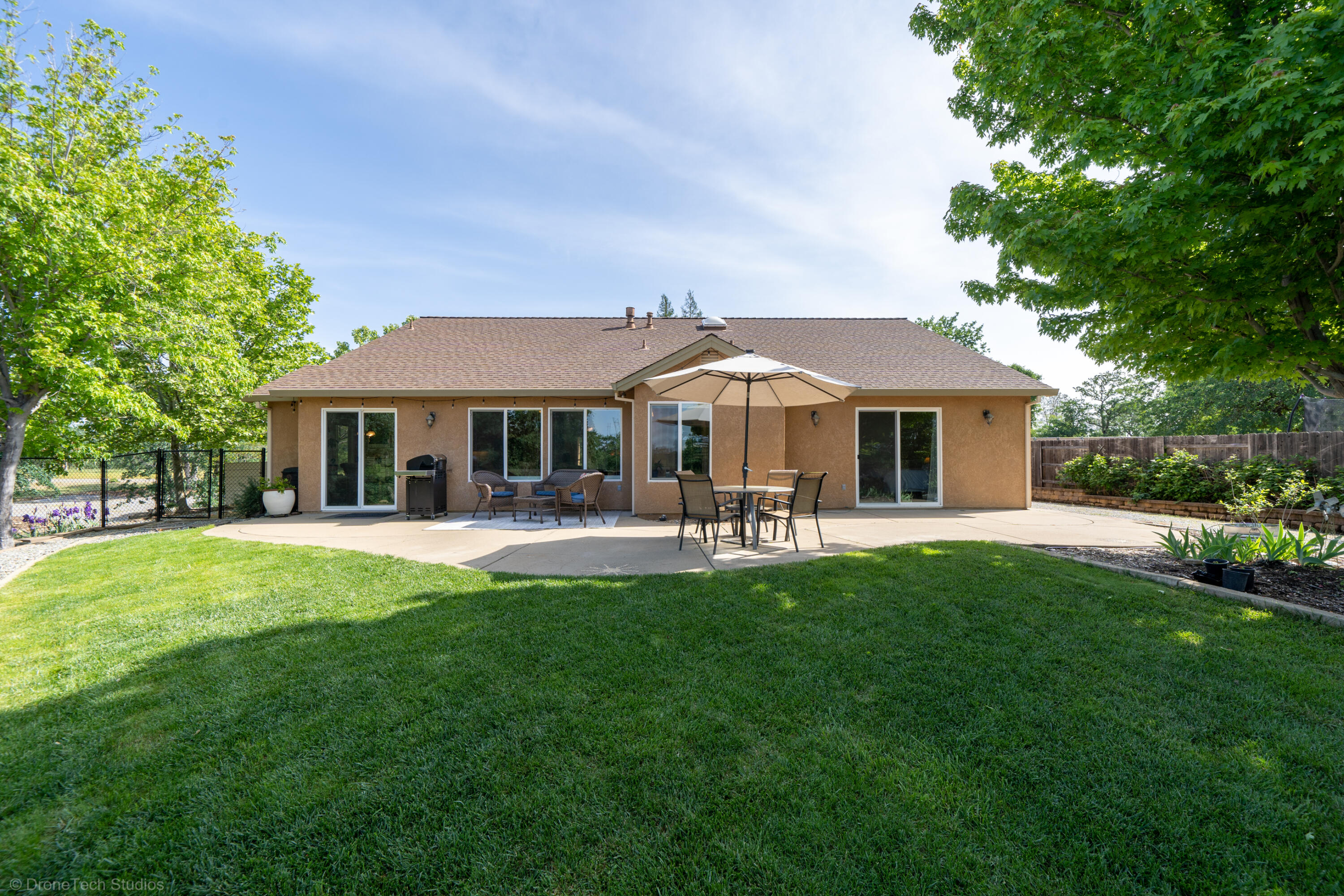 16671 Power Line Road Redding, CA 96001 - Photo 35 of 105 Fenced backyard