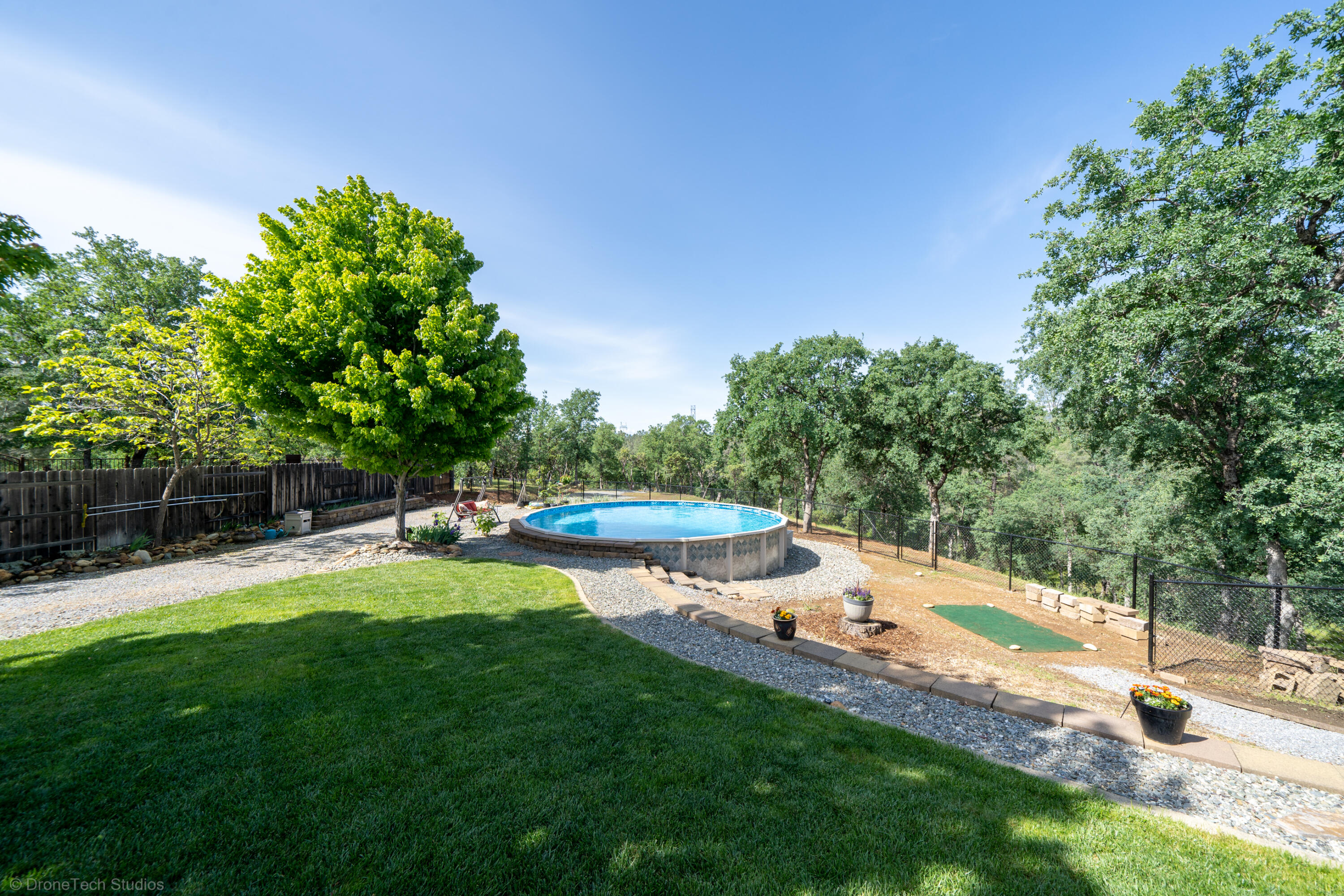 16671 Power Line Road Redding, CA 96001 - Photo 53 of 105 Lawn area near pool