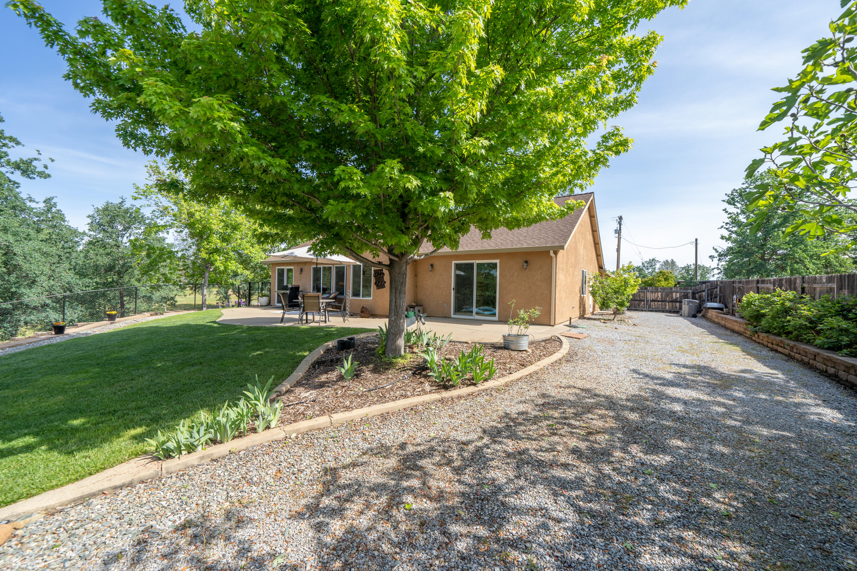 16671 Power Line Road Redding, CA 96001 - Photo 60 of 105 Side yard access