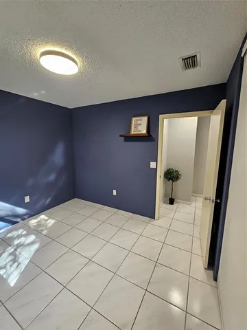 a view of a livingroom with furniture