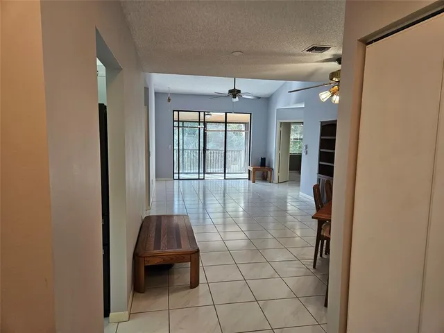 a view of entryway with livingroom and window