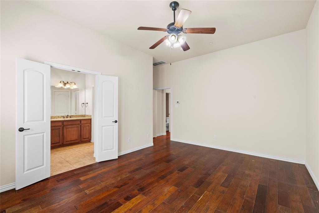 6465 Naples Drive Irving, TX 75039 - Photo 13 of 25 a view of a kitchen with a sink and a refrigerator