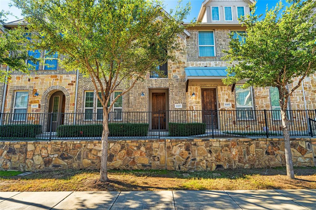 6465 Naples Drive Irving, TX 75039 - Photo 2 of 25 a front view of a house with a garden
