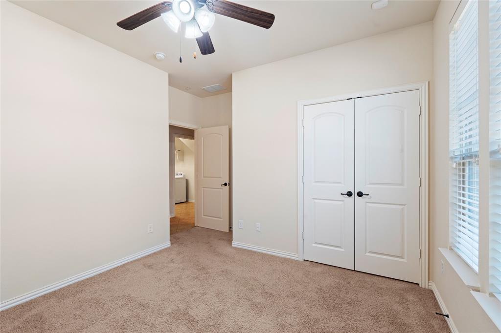 6465 Naples Drive Irving, TX 75039 - Photo 24 of 25 a view of an empty room and chandelier fan