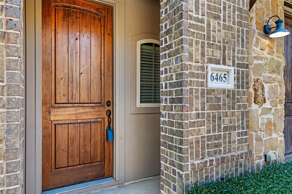6465 Naples Drive Irving, TX 75039 - Photo 3 of 25 a view of a wooden door