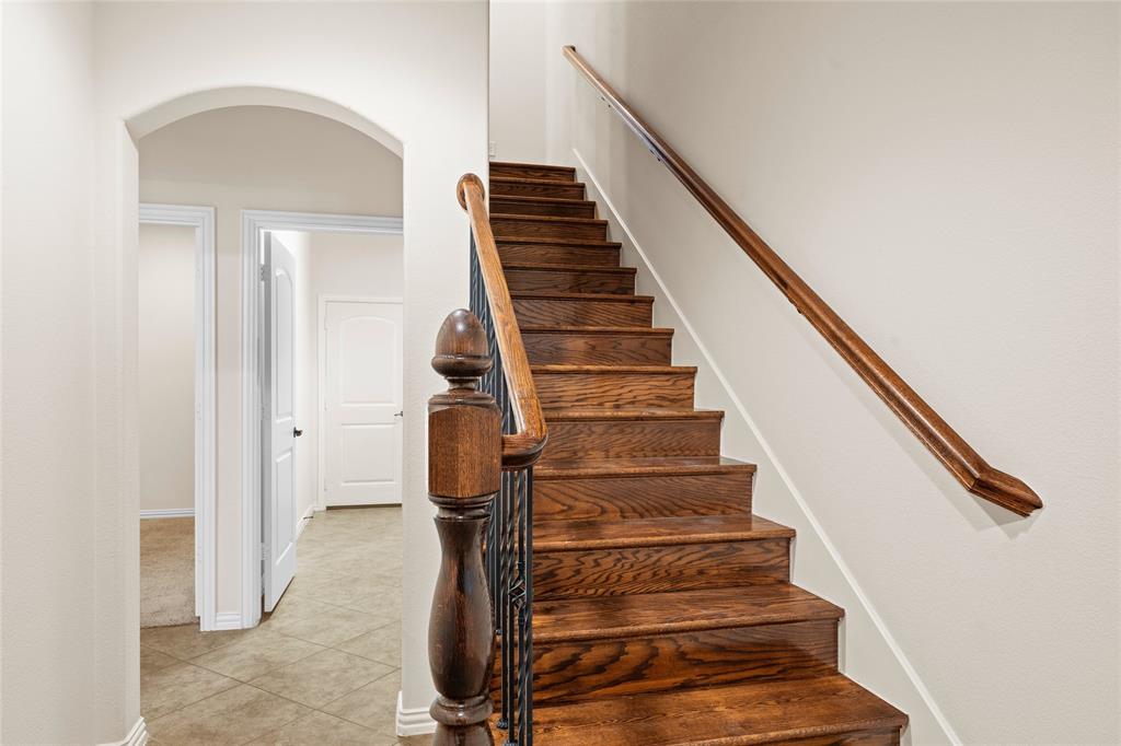 6465 Naples Drive Irving, TX 75039 - Photo 4 of 25 a view of entryway with wooden floor