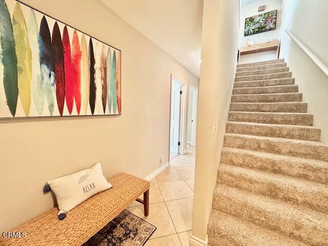 3721 Sunset Lane Oxnard, CA 93035 - Photo 15 of 26 a view of a hallway with wooden floor and couch