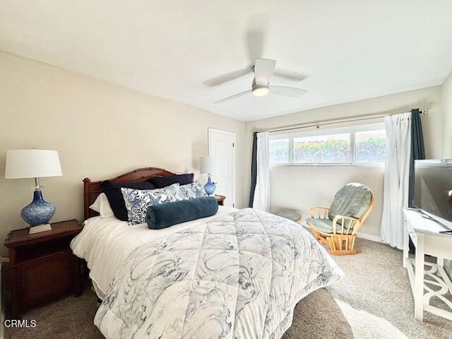 3721 Sunset Lane Oxnard, CA 93035 - Photo 17 of 26 a bedroom with a bed and wooden floor