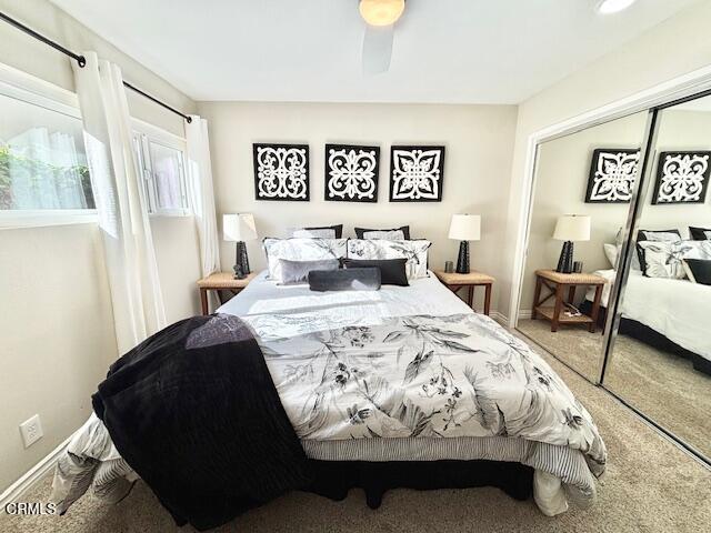 3721 Sunset Lane Oxnard, CA 93035 - Photo 20 of 26 a bedroom with a large bed and a couch