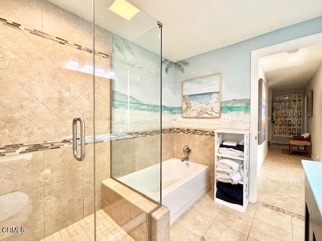 3721 Sunset Lane Oxnard, CA 93035 - Photo 23 of 26 a bathroom with a tub and shower