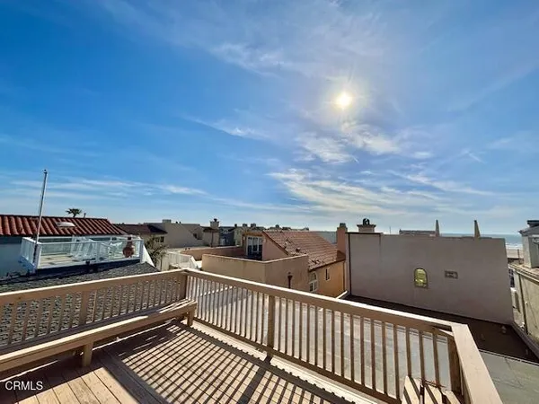 a view of balcony with furniture