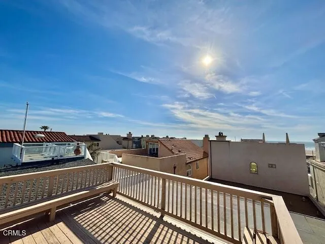 a view of balcony with furniture