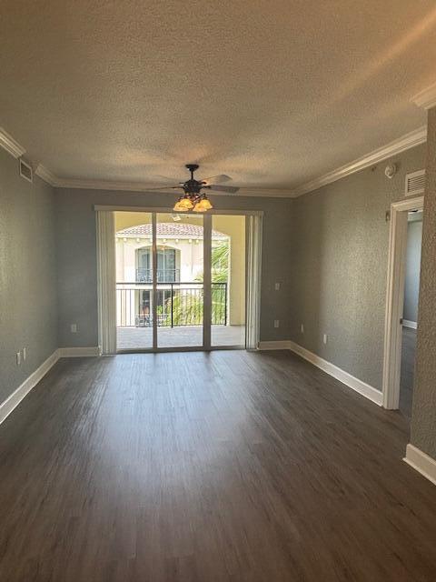 2401 Renaissance Way Boynton Beach, FL 33426 - Photo 14 of 21 an empty room with wooden floor and windows