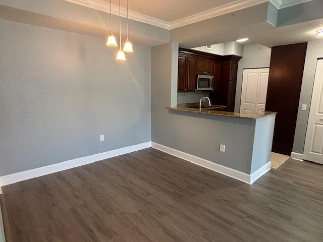 2401 Renaissance Way Boynton Beach, FL 33426 - Photo 8 of 21 a view of a kitchen with wooden floor and electronic appliances