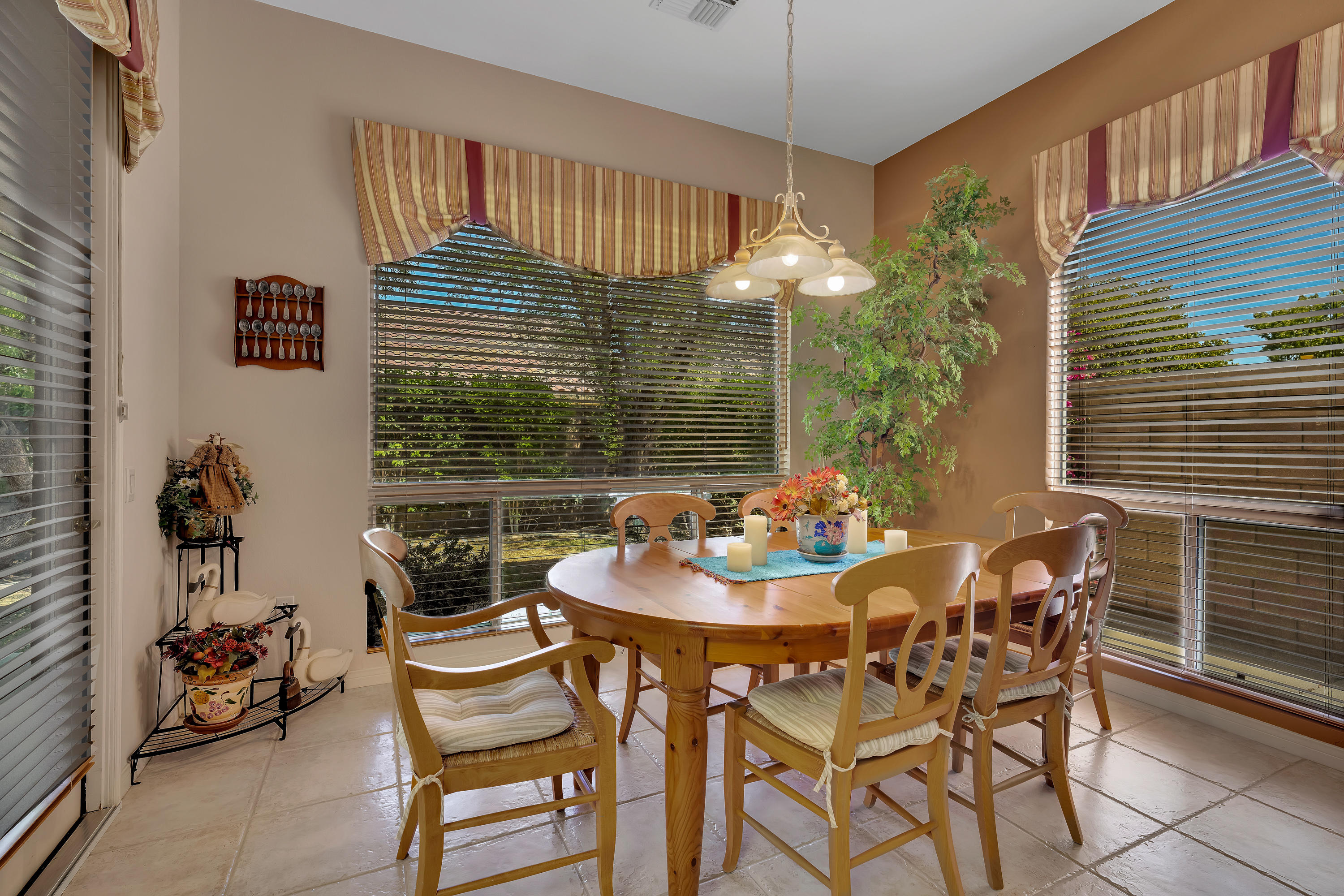 37384 Wyndham Road Palm Desert, CA 92211 - Photo 19 of 30 a dining room with furniture and window
