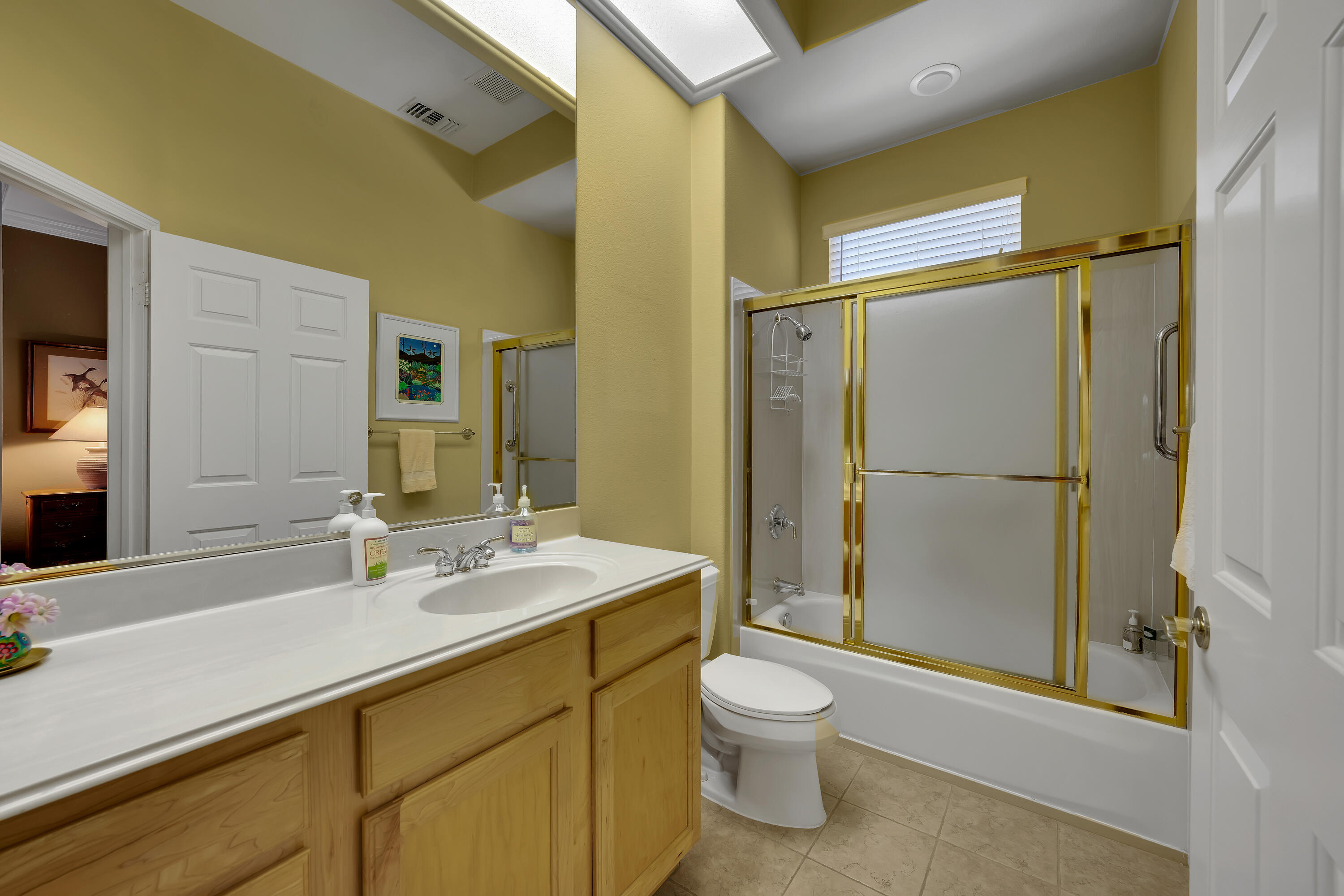 37384 Wyndham Road Palm Desert, CA 92211 - Photo 26 of 30 a bathroom with a sink a toilet and shower