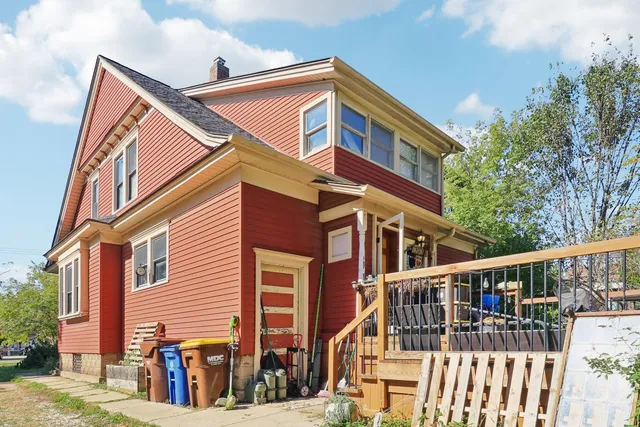 a view of a house with a street