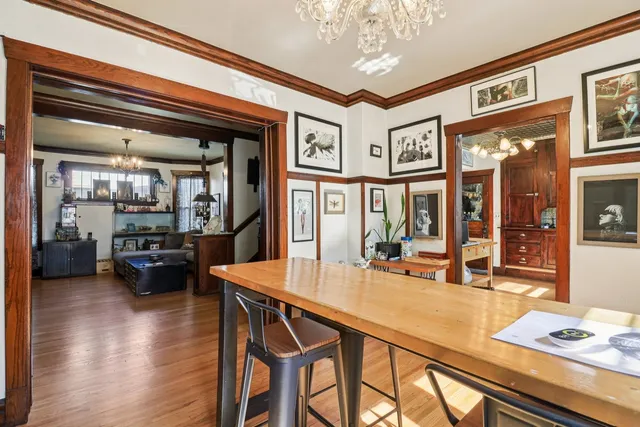 a lobby with furniture and wooden floor