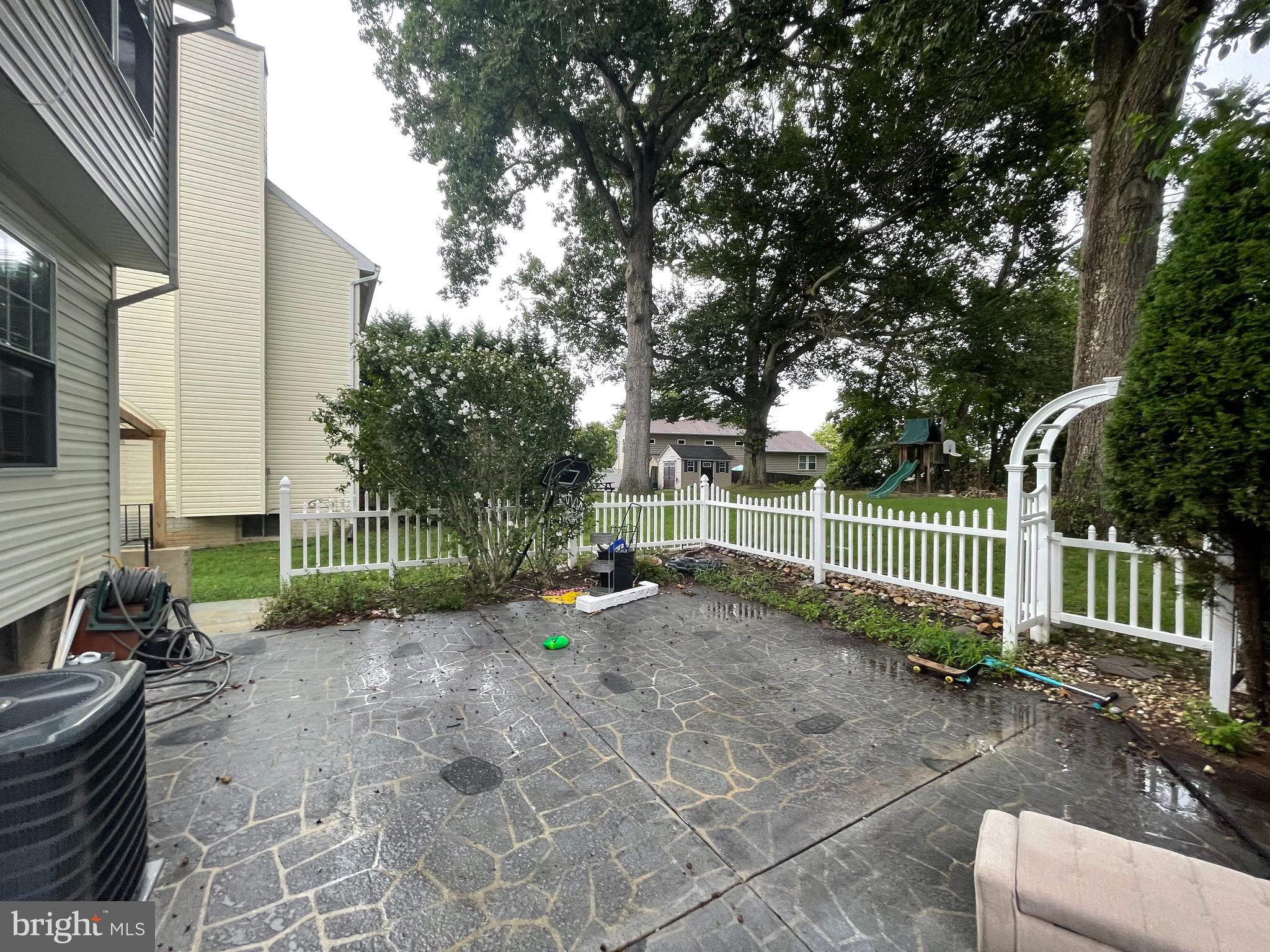 6375 Waterloo Road Elkridge, MD 21075 - Photo 18 of 18 a view of a yard with plants and trees