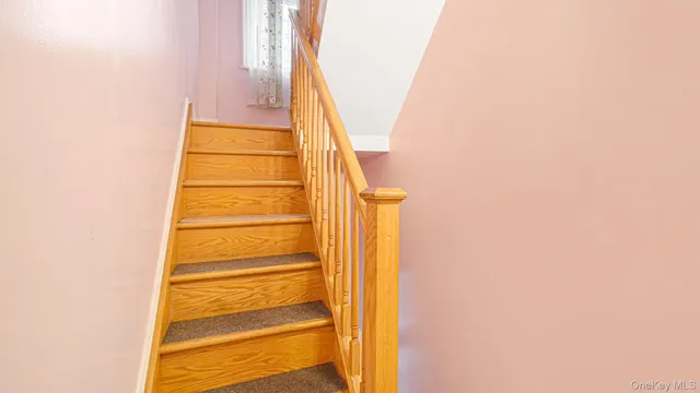 a living room with furniture and windows