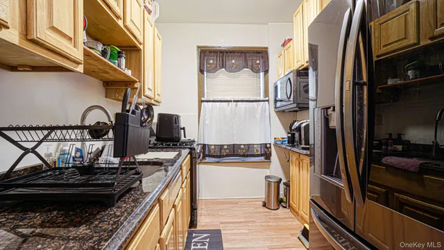 a view of livingroom with furniture and window