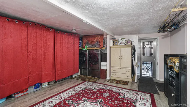 a bathroom with a toilet sink and vanity