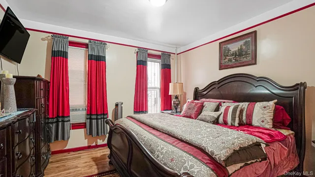 a bedroom with a bed and a closet