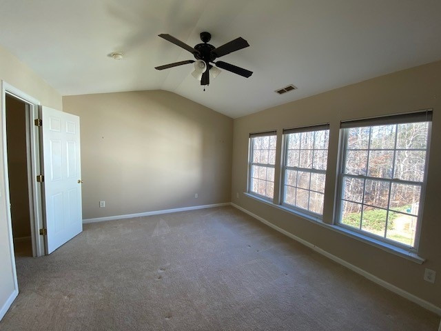 4235 Vienna Crest Drive Raleigh, NC 27613 - Photo 5 of 11 a view of an empty room with a window