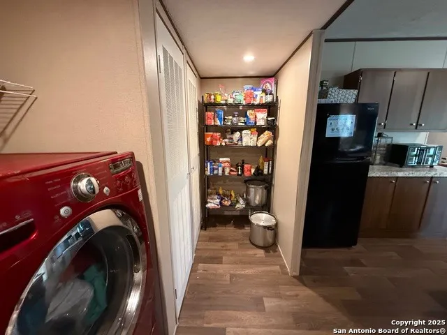 a view of a storage & utility room with washer and dryer