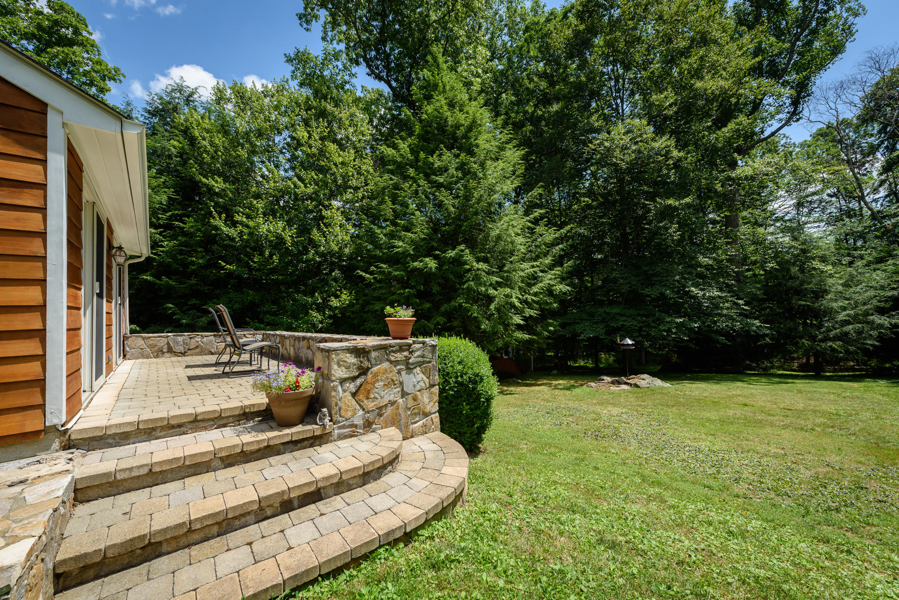 52 Boulderol Road Stamford, CT 06903 - Photo 14 of 18 a view of garden with patio
