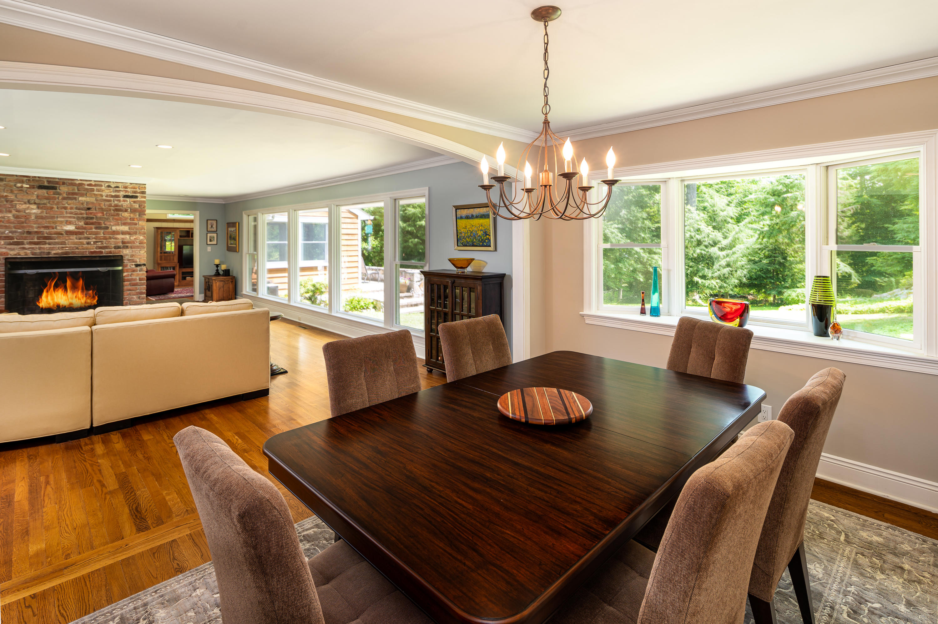 52 Boulderol Road Stamford, CT 06903 - Photo 7 of 18 a view of a dining room with furniture wooden floor and chandelier