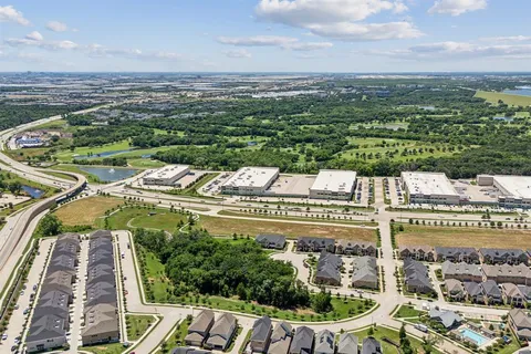 an aerial view of a house with a garden