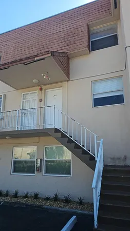 a view of a house with a swimming pool