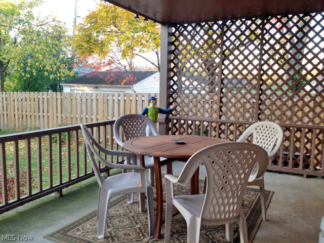 2604 Fenwick Road Cleveland, OH 44118 - Photo 18 of 19 Covered porch completes this lovely backyard with wood fencing