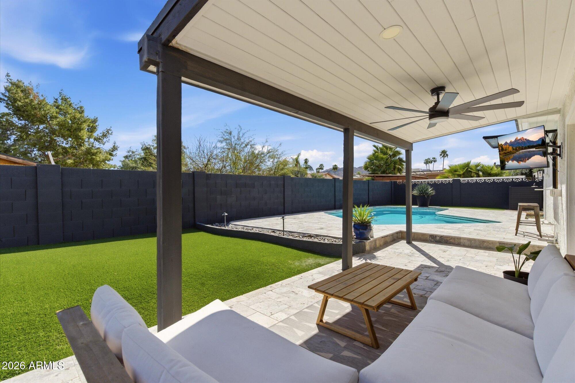 10245 North 34th Place Phoenix, AZ 85028 - Photo 22 of 26 a building outdoor space with patio furniture